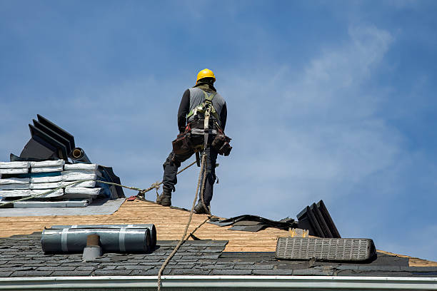 Professional Gutter Installation technician working in Mc Henry, MS